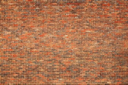 Old large red brick wall background